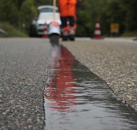 ColdFill applied with screed to repair cracks in roads