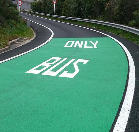 Green two component resin for durable bus lane surfaces