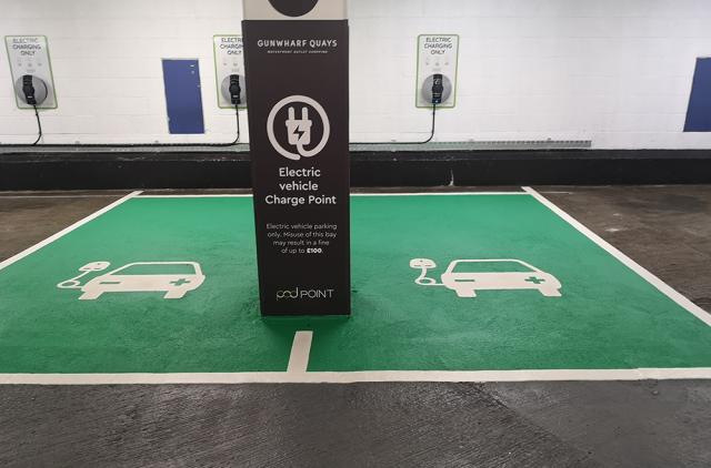 Electric charging bays with preformed symbols at Gunwharf Quays