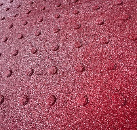 Zoom on red granite TacPad tactile dome