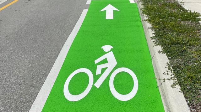 OPTATRAC bicycle lane symbols applied as preformed road marking symbols