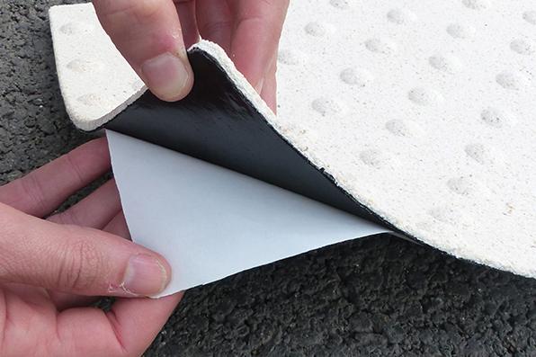 MX application system for adhesive tactile markings